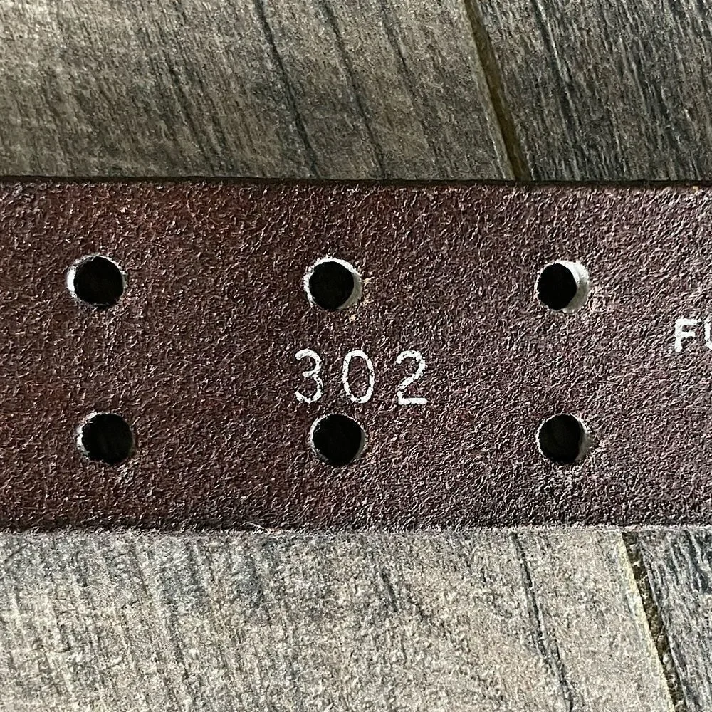 Brown Leather Belt with silver Buckle. 37 inches.